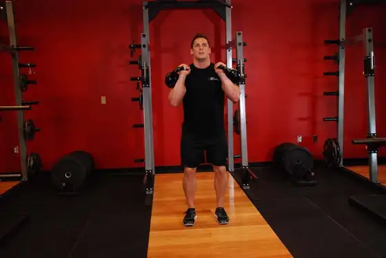 Double Kettlebell Jerk — end position