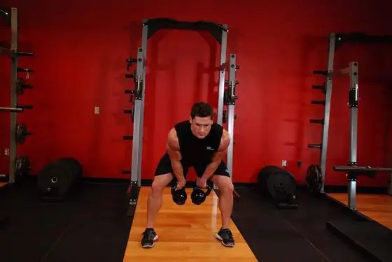 Double Kettlebell Snatch — end position