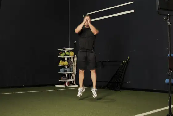 Double Leg Butt Kick — end position