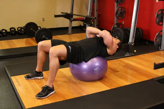 Exercise Ball Crunch — start position