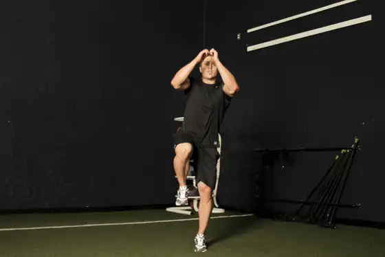 Single Leg Butt Kick — end position