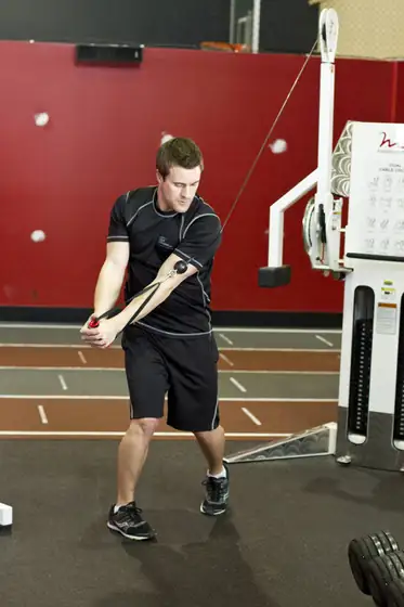Standing Cable Wood Chop — end position