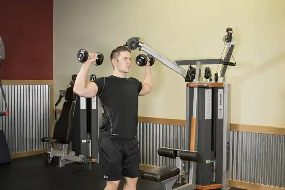 Standing Dumbbell Press — start position